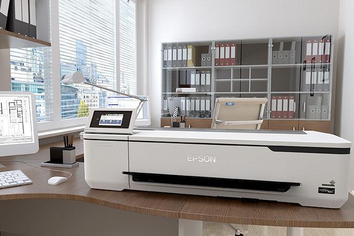 Plotter Epson SureColor T3170 em escritório técnico com desenho de projeto na tela