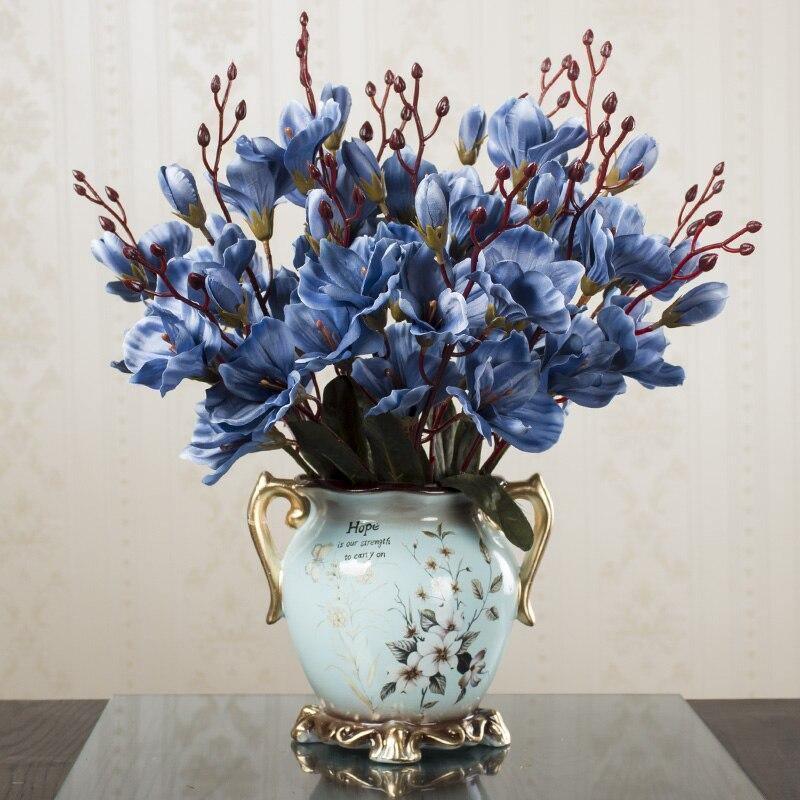 Conjunto Vaso de Cerâmica Fuzzi + Flores - Mega Market